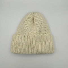 A gray wool beanie with a chunky knit design, displayed on a white background.