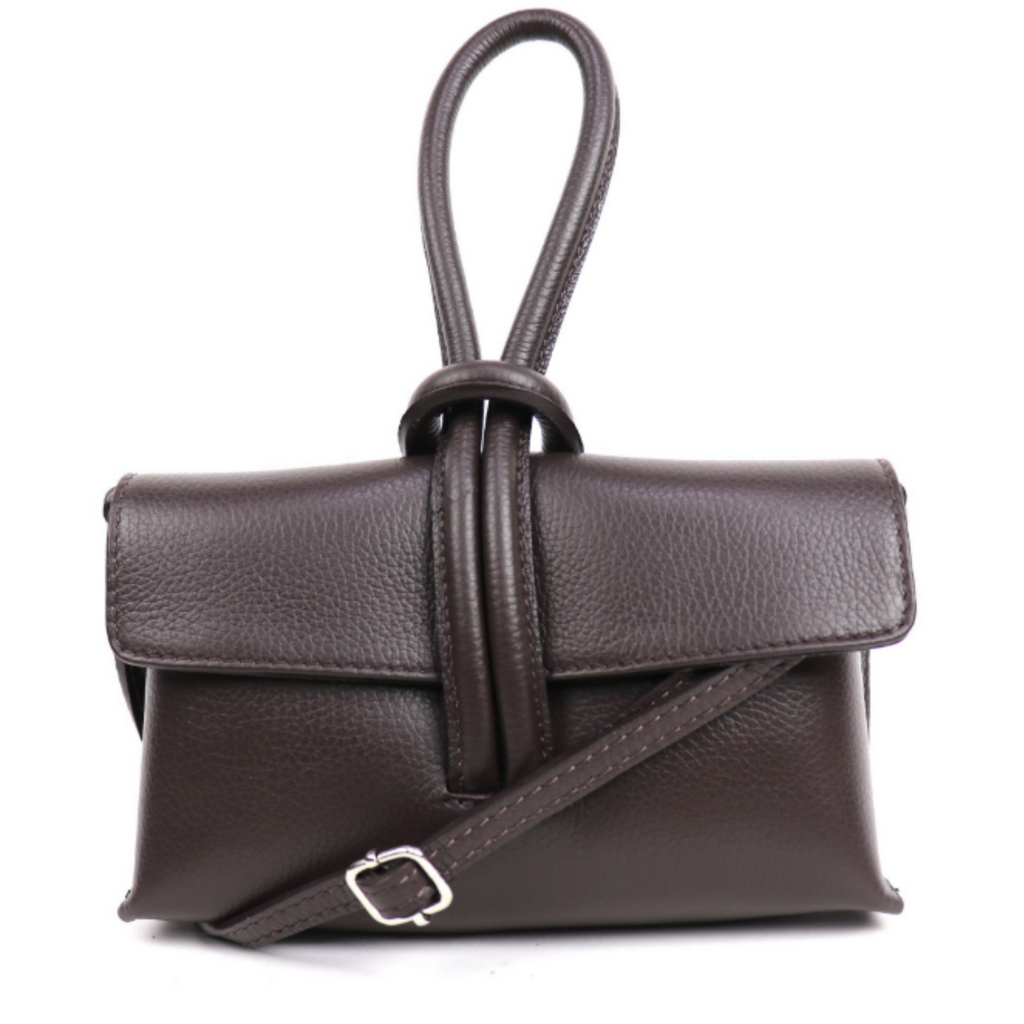 Brown leather handbag with a strap on a white background