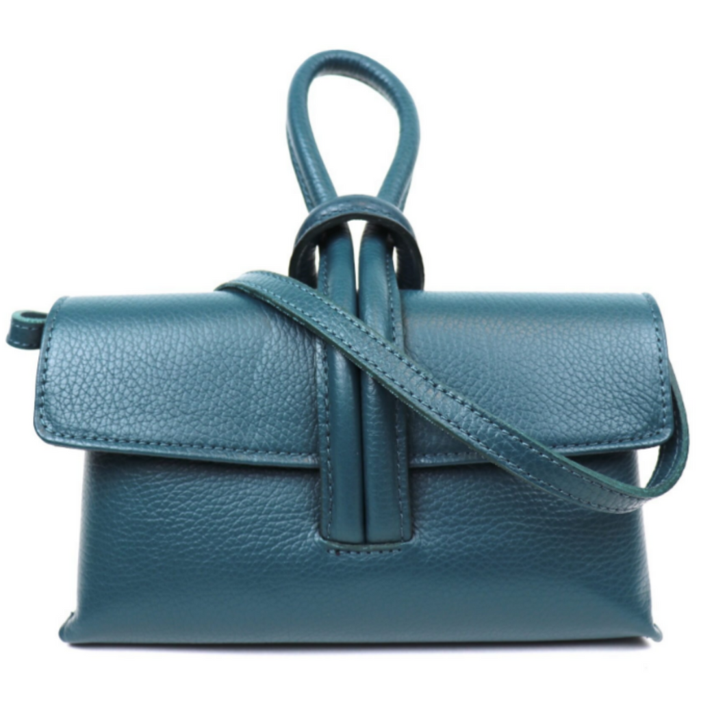 Teal leather handbag with a strap on a white background
